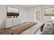 Modern bedroom features soft natural light, white walls, and stylish decor at 60 Valley Nw St, Concord, NC 28025