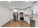 Modern kitchen with stainless steel appliances and white cabinets at 60 Valley Nw St, Concord, NC 28025