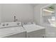 Bright laundry room with washer and dryer at 60 Valley Nw St, Concord, NC 28025