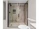 Beautiful walk-in shower features marble and glass doors at 60 Valley Nw St, Concord, NC 28025