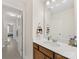 A well-lit bathroom featuring modern fixtures, including a sink and vanity with ample counter space at 603 Southstone Dr, Matthews, NC 28104