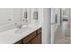 A bathroom featuring a sleek vanity with modern fixtures and a well-lit mirror at 603 Southstone Dr, Matthews, NC 28104