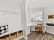 Mudroom with built-in bench and desk perfect for organization and study at 603 Southstone Dr, Matthews, NC 28104