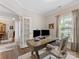 Comfortable office space with a wooden desk, two computer monitors, and neutral wall tones at 603 Southstone Dr, Matthews, NC 28104