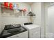 Laundry room featuring a washer and dryer and shelves with storage at 6037 Chelsea Oaks Rdg # 77, Tega Cay, SC 29708