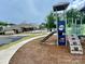 Community playground and pool area at 6037 Chelsea Oaks Rdg # 77, Tega Cay, SC 29708
