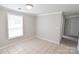 Bright dining room featuring tile floors, a large window, and neutral walls at 6124 Old Mt Holly Rd, Charlotte, NC 28208