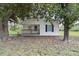 Charming home featuring a covered front porch and a well-maintained white exterior at 6124 Old Mt Holly Rd, Charlotte, NC 28208