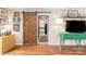 Stylish living room showcasing a sliding barn door and trendy decor at 618 Heathermoor Ct, Charlotte, NC 28209
