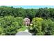 Stunning two-story brick home surrounded by lush trees and a well-manicured front yard at 655 Powder Horn Ln, Indian Trail, NC 28079