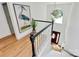 Bright foyer with staircase, large window, chandelier, and a heron painting, creating an inviting entrance at 655 Powder Horn Ln, Indian Trail, NC 28079