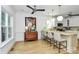 Large kitchen features island with bar stools and stainless steel appliances at 655 Powder Horn Ln, Indian Trail, NC 28079