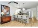 Spacious kitchen featuring an island with seating, stainless appliances, and ample natural light at 655 Powder Horn Ln, Indian Trail, NC 28079