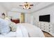 Large primary bedroom featuring vaulted ceilings, ensuite bath access, and plenty of natural light at 655 Powder Horn Ln, Indian Trail, NC 28079