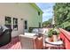 Spacious outdoor deck with comfortable seating and a grill at 655 Powder Horn Ln, Indian Trail, NC 28079