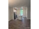 Modern kitchen with stainless steel appliances and bright lighting, perfect for cooking at 7 Scott Sw St, Concord, NC 28025