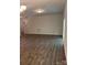 Spacious living room featuring modern hardwood floors and a cozy atmosphere at 7 Scott Sw St, Concord, NC 28025