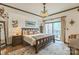 Bright bedroom with balcony access, stylish chandelier, and cityscape views, offering a tranquil urban oasis at 715 N Church St # 613, Charlotte, NC 28202