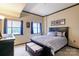 Comfortable bedroom featuring a large window and plush furnishings for a restful retreat at 715 N Church St # 613, Charlotte, NC 28202