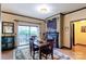 Cozy dining area featuring a fireplace, balcony access, and built-in speakers perfect for entertaining guests at 715 N Church St # 613, Charlotte, NC 28202
