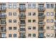 Building exterior with multiple balconies, windows and neutral color palette at 715 N Church St # 613, Charlotte, NC 28202