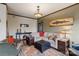 Inviting living room with a comfortable sofa, ottoman, hardwood floors, and elegant chandelier at 715 N Church St # 613, Charlotte, NC 28202