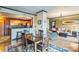 Open-concept living space with modern kitchen, dining area and comfortable sitting area with ample natural light at 715 N Church St # 613, Charlotte, NC 28202