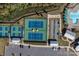 Aerial view of a community including tennis courts, bocce ball courts, a swimming pool and parking at 7332 Jolly Brook Dr, Charlotte, NC 28215