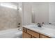 Bathroom with shower-tub combo, bronze fixtures, and a vanity at 7332 Jolly Brook Dr, Charlotte, NC 28215