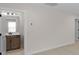 Bedroom view towards an ensuite bathroom with a granite countertop vanity at 7332 Jolly Brook Dr, Charlotte, NC 28215