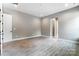 Bedroom featuring wood-look flooring, recessed lights, and walk-in closet at 7517 Lancaster Hwy # 5, Waxhaw, NC 28173
