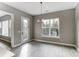 Dining room with natural light, modern lighting fixtures, and access to the outdoor space at 7517 Lancaster Hwy # 5, Waxhaw, NC 28173