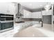 Kitchen featuring modern stainless steel appliances, granite countertops, and ample cabinet space at 7517 Lancaster Hwy # 5, Waxhaw, NC 28173