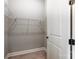 Walk-in closet featuring wire shelving and wood-look flooring at 7517 Lancaster Hwy # 5, Waxhaw, NC 28173