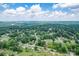 Expansive aerial view showcasing a neighborhood surrounded by lush greenery at 814 Rhodann Dr, Shelby, NC 28152