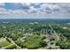 Scenic aerial view of a neighborhood with lush trees and blue skies at 814 Rhodann Dr, Shelby, NC 28152