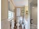 Neutral bathroom featuring tiled walls, a pedestal sink, and an enclosed shower area at 814 Rhodann Dr, Shelby, NC 28152