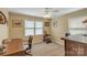 Bright bedroom with dual windows, ceiling fan, and space for a desk at 814 Rhodann Dr, Shelby, NC 28152