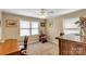 Bright bedroom with dual windows, ceiling fan, and space for a desk at 814 Rhodann Dr, Shelby, NC 28152