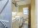 Laundry room with a washer and dryer, a built-in utility sink, and a small bathroom at 814 Rhodann Dr, Shelby, NC 28152