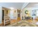 Inviting living room with wood floors, decorative rug, and access to multiple rooms at 814 Rhodann Dr, Shelby, NC 28152