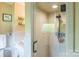 Enclosed shower with neutral tile and a modern shower head and fixture at 814 Rhodann Dr, Shelby, NC 28152