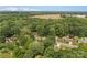 An aerial view of a wooded neighborhood with nearby open land available for construction and development at 844 Fieldstone Rd, Mooresville, NC 28115