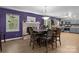 The open concept offers a dining room with a fireplace and kitchen at 844 Fieldstone Rd, Mooresville, NC 28115