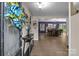 Elegant entryway showcasing hardwood floors, decorative accents, and an open view into the dining area at 844 Fieldstone Rd, Mooresville, NC 28115