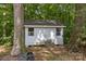 Exterior of a white storage shed surrounded by foliage at 844 Fieldstone Rd, Mooresville, NC 28115