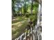 A backyard with trees and a bird house at 8524 Anette Ave, Mint Hill, NC 28227
