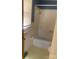 A bathroom featuring a shower and tub, window and yellow tile floors at 8524 Anette Ave, Mint Hill, NC 28227