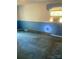 A bedroom featuring blue walls, patterned wallpaper and an older window air conditioner unit at 8524 Anette Ave, Mint Hill, NC 28227