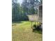 View of the backyard from the deck. Serene outdoor space perfect for relaxation and entertaining at 8524 Anette Ave, Mint Hill, NC 28227
